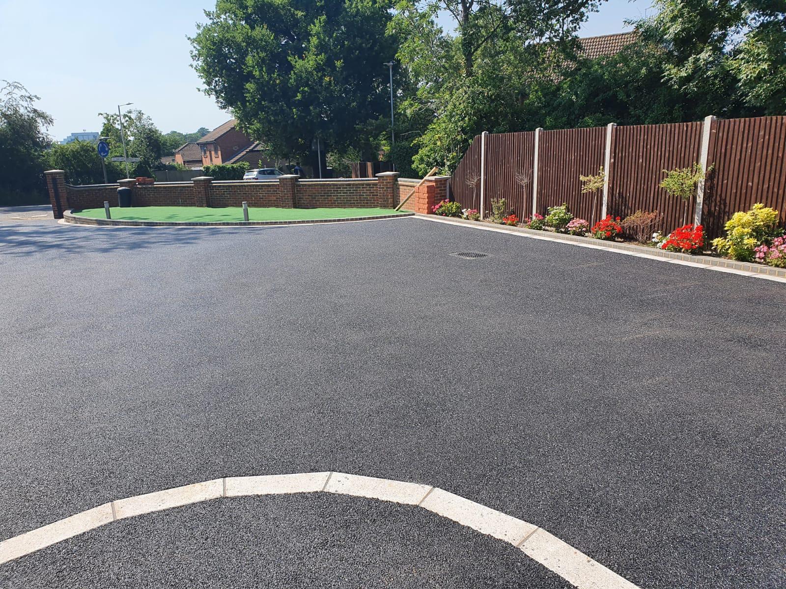 Wrap around porcelain patio and driveway works