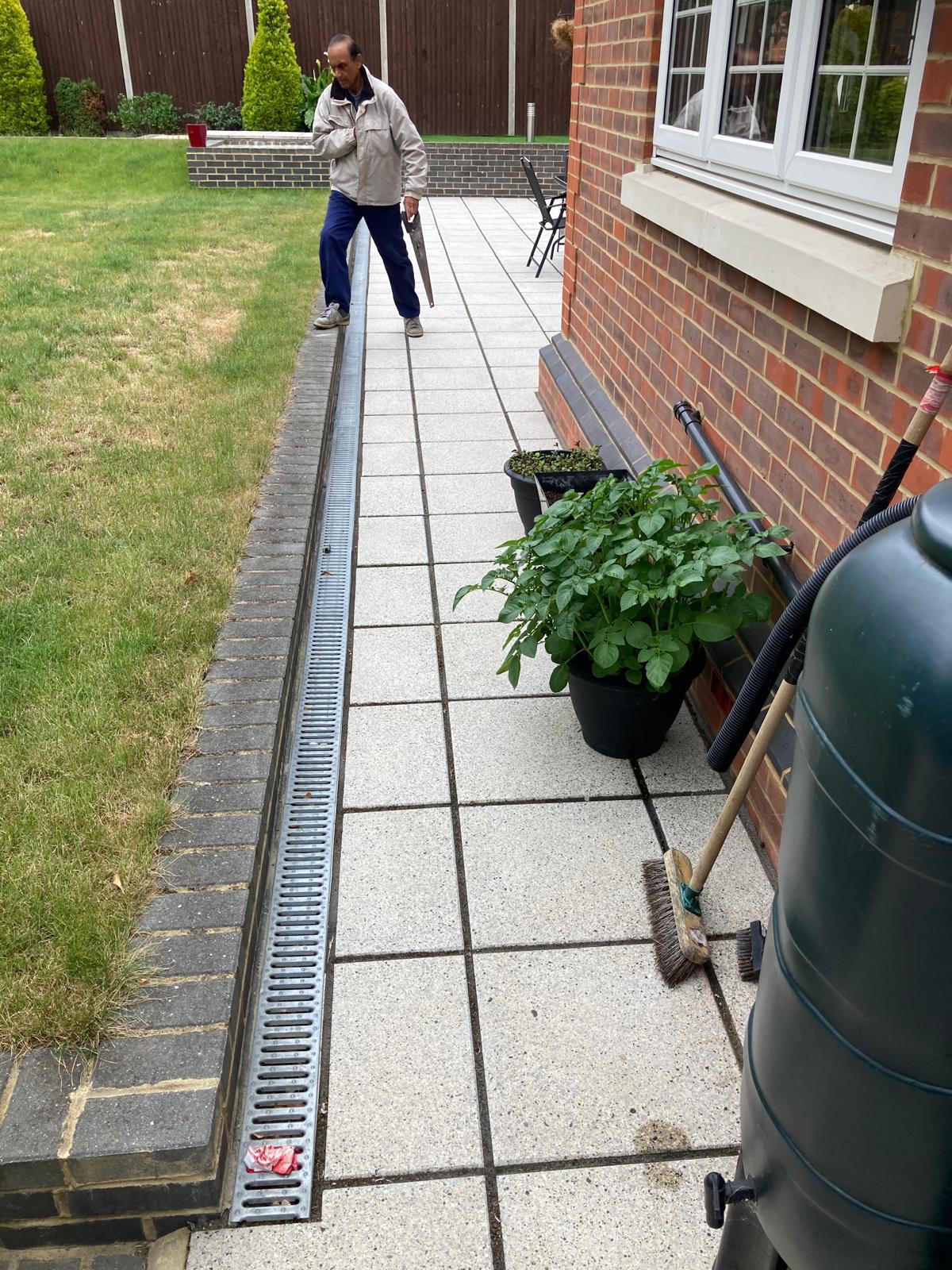 Wrap around porcelain patio and driveway works